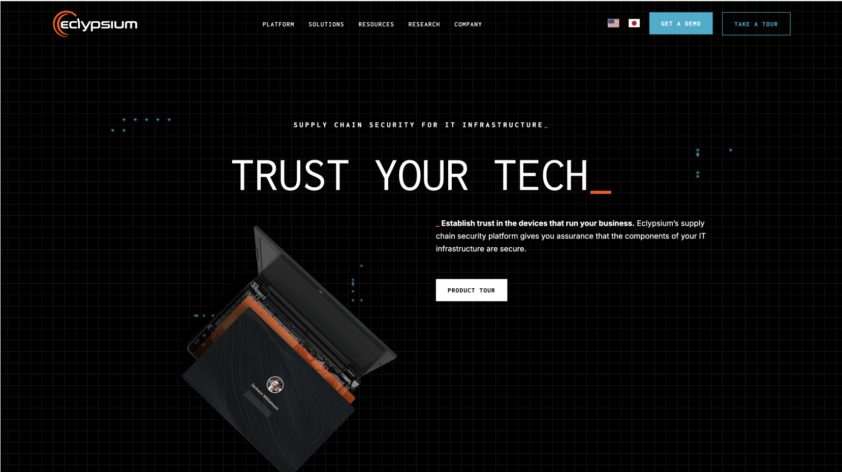 A black grid background with a laptop displaying a profile picture and the text "Jackson Williams" on the screen, positioned