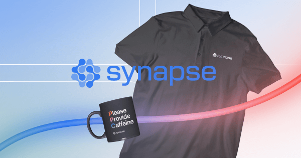 A black polo shirt with the Synapse logo, a coffee mug with "Please Provide Caffeine," and colorful curved lines in the